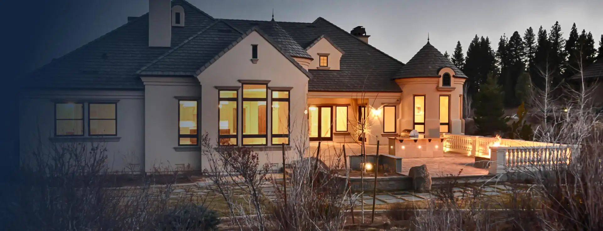 Completed C&E Builders custom home at dusk