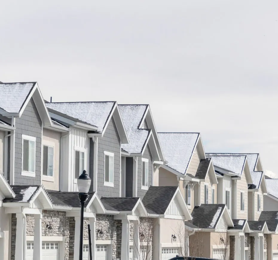 Completed row of C&E Builders production homes